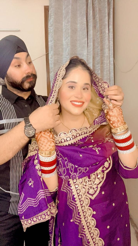 Unstitched Suit with Potli Bags